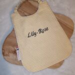 Bavoir élastique vichy jaune